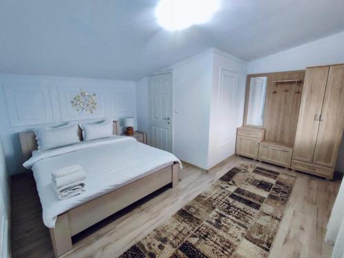 Pensiunea Sub Horiță客房内的一张或多张床位