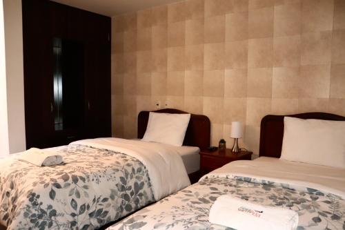 奇瓦伊Hotel Sierra Alta Colca的两张床位 - 带两张西德西德床