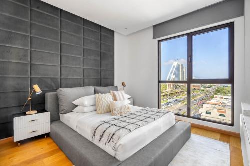 GuestReady - Coastal Living near Burj Al Arab客房内的一张或多张床位