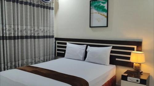 H. V Hotel Bandara Gorontalo客房内的一张或多张床位