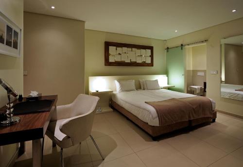 129克卢夫纳克公寓式酒店客房内的一张或多张床位