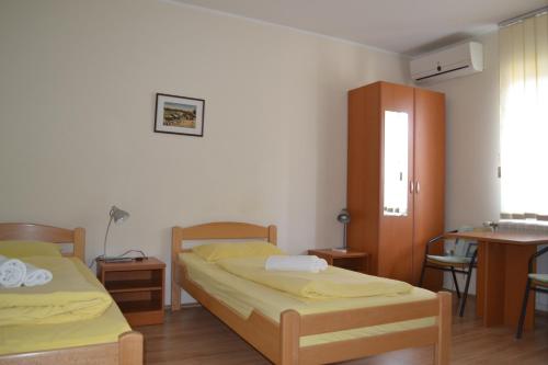 Apartments Tanja客房内的一张或多张床位