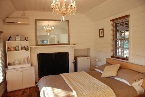 曼库索乡村小屋农家乐客房内的一张或多张床位