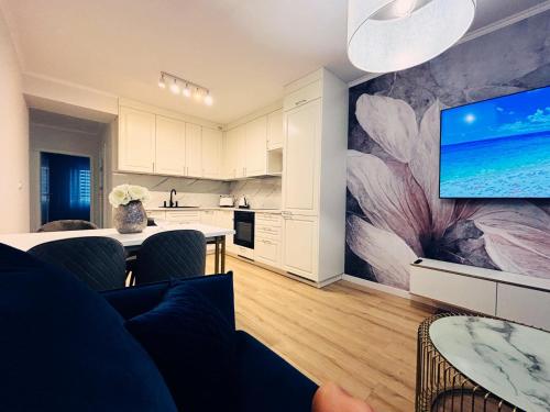 Apartament Bella White dla 8 osob z Klimatyzacja的厨房或小厨房