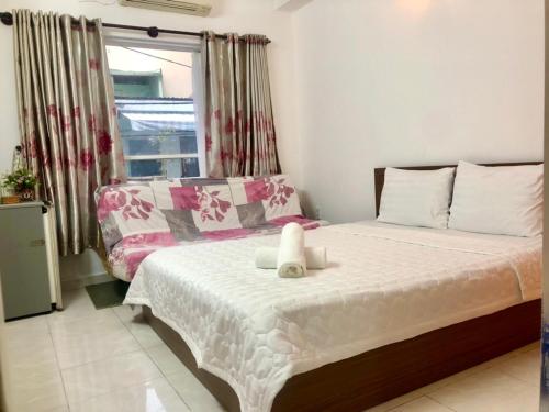 Thanhha Guesthouse At Bui Vien Walking Street客房内的一张或多张床位