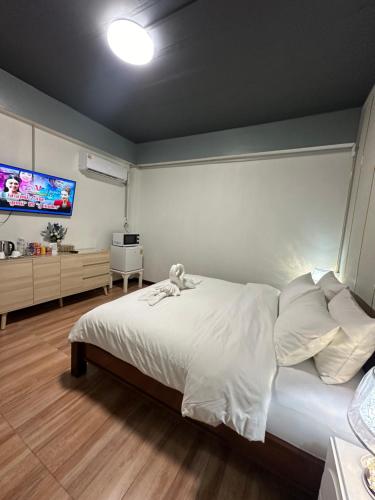 Service Apartment ห้อง102 ใจกลางเมืองใกล้แหล่งท่องเที่ยว客房内的一张或多张床位