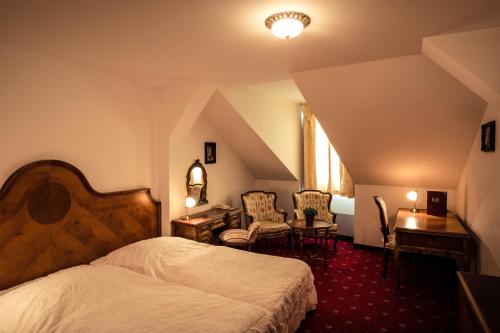 什特克尔酒店客房内的一张或多张床位