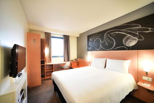 
莫斯科迪纳摩宜必思酒店客房内的一张或多张床位
