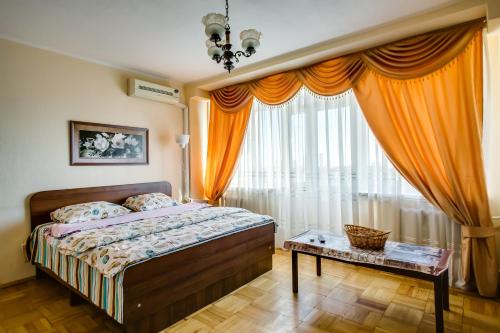 Apartment on Voroshilovskiy客房内的一张或多张床位