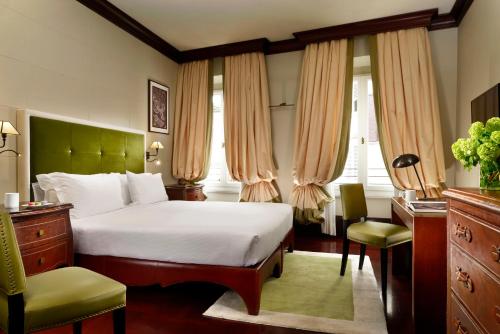 Hotel L'Orologio - WTB Hotels客房内的一张或多张床位