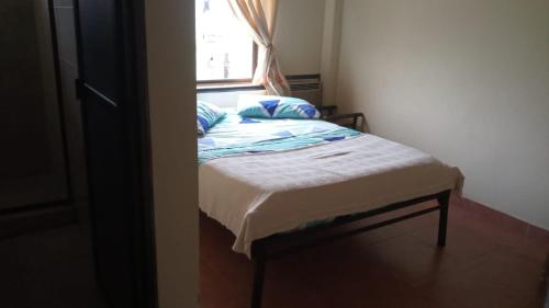 Hostal SAN JOSE PLAZA - TAYRONA 1客房内的一张或多张床位