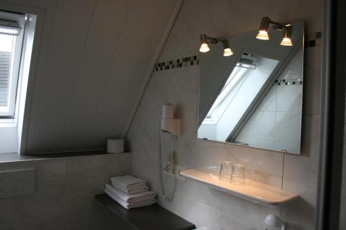 维特韦尔酒店的一间浴室