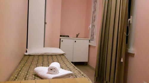 帕尔玛酒店客房内的一张或多张床位