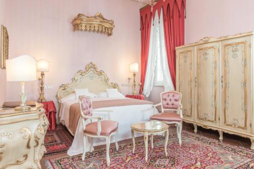 Duchessa Isabella Collection by Uappala Hotels客房内的一张或多张床位