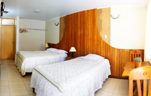 杜尔塞埃斯坦西亚旅馆客房内的一张或多张床位