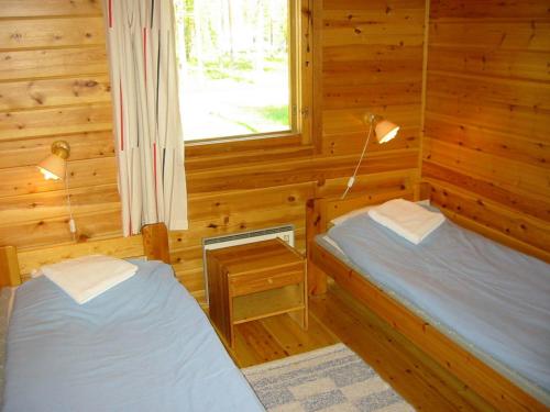 乌孔湖度假村客房内的一张或多张床位