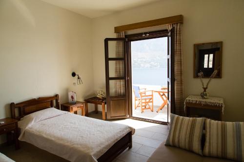 Hotel Porto Potha客房内的一张或多张床位