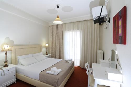 雅典三角洲酒店 客房内的一张或多张床位