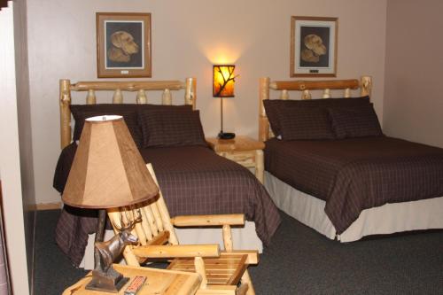 格莱斯顿旅馆及套房酒店客房内的一张或多张床位