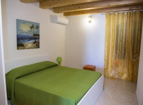 Casa Vacanze Calafarina客房内的一张或多张床位