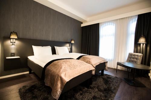 K7 Hotel Oslo客房内的一张或多张床位