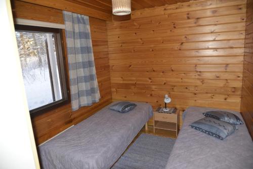 泰尤图威特山林小屋客房内的一张或多张床位