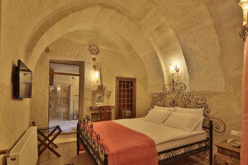 Jacob's Cave Suites - Cappadocia客房内的一张或多张床位