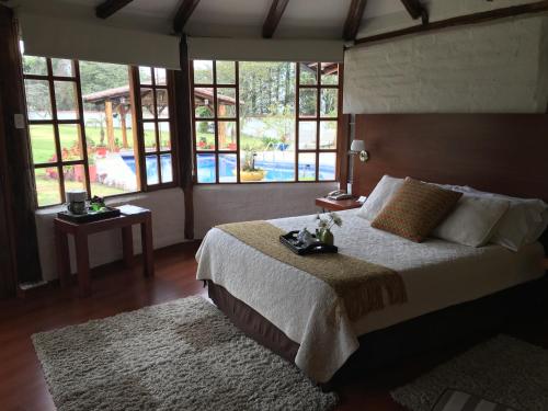 卡萨德坎波塔巴贝拉精品酒店客房内的一张或多张床位