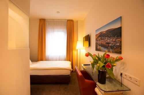 海德堡霍夫酒店客房内的一张或多张床位