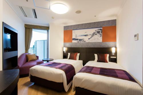 两国美景酒店客房内的一张或多张床位