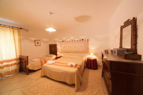 Su Cantaru Guesthouse客房内的一张或多张床位