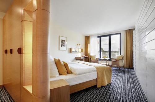 爱斯普兰纳德Spa度假酒店 - 仅限成人入住客房内的一张或多张床位