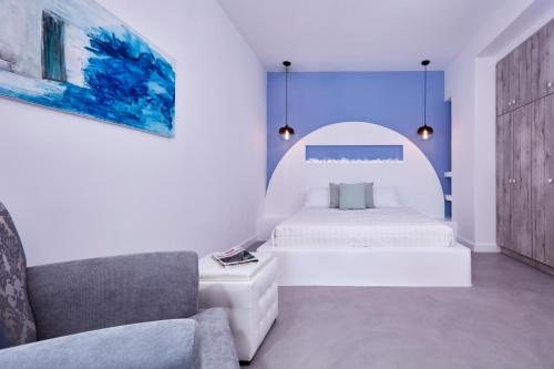 Orabel Suites Santorini (Adults Only)客房内的一张或多张床位