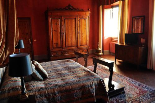 乐克西欧别墅Il酒店客房内的一张或多张床位