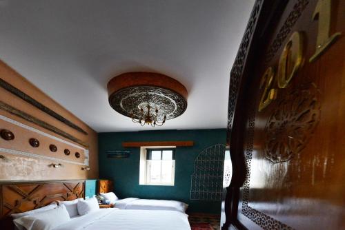 奥戴亚斯酒店客房内的一张或多张床位