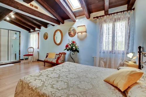 洛坎达安蒂科费欧雷酒店客房内的一张或多张床位