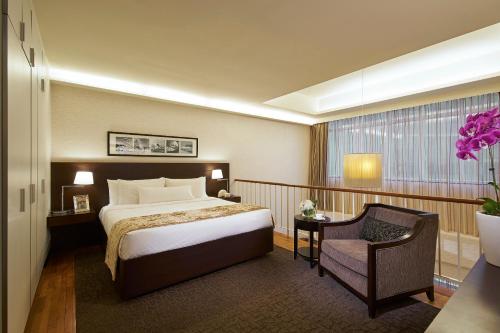 远东酒店集团乌节园公寓客房内的一张或多张床位