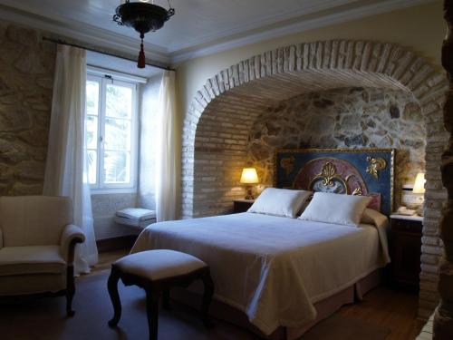 圣贝尼托修道院酒店客房内的一张或多张床位