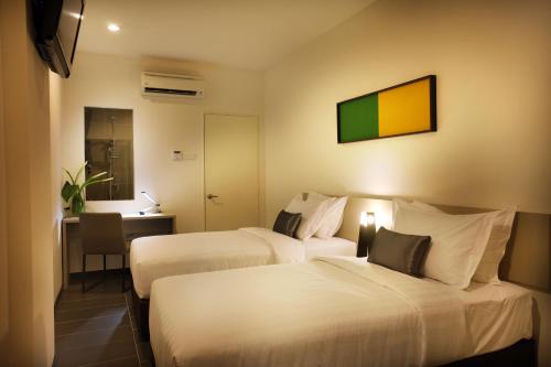 O'Boutique Suites Hotel @ Bandar Utama客房内的一张或多张床位