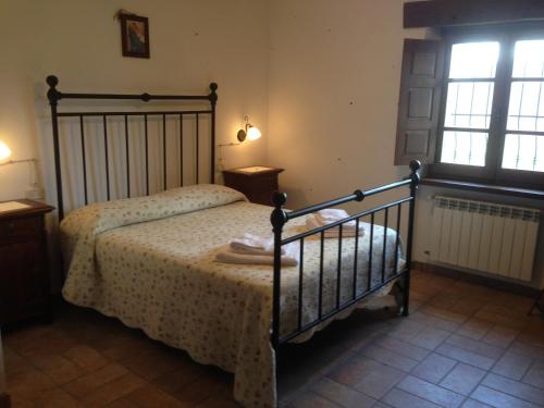 波德里波吉奥贝尼代托酒店客房内的一张或多张床位