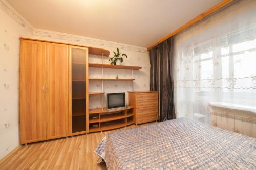 Kvartirov Apartments at Kosmos客房内的一张或多张床位