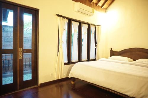 巴厘巴厘岛普拉斯奇塔酒店客房内的一张或多张床位