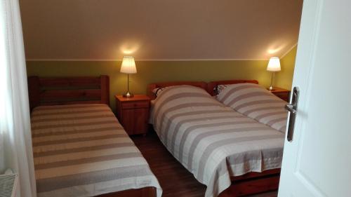 斯隆兹那扎格洛达阳光岭农家乐客房内的一张或多张床位