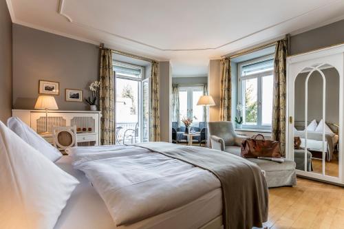 Romantik Hotel Schweizerhof & Spa客房内的一张或多张床位