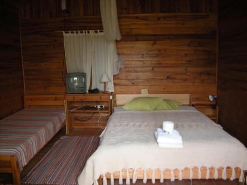 科英布拉露营地/公寓客房内的一张或多张床位