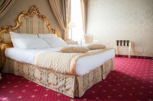 卡马迪酒店住宿加早餐旅馆客房内的一张或多张床位
