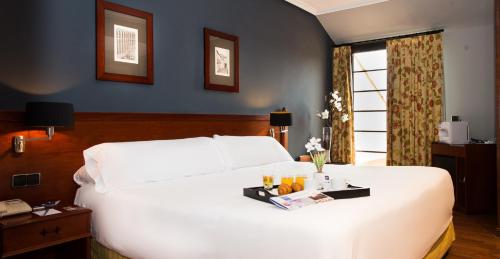 塞戈维亚瓜达拉马山脉酒店客房内的一张或多张床位
