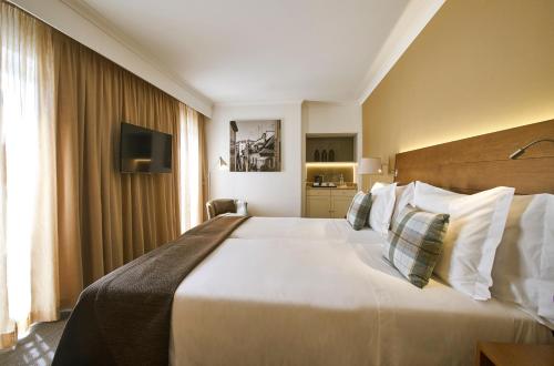 马尔克斯波尔图湾度假酒店 客房内的一张或多张床位