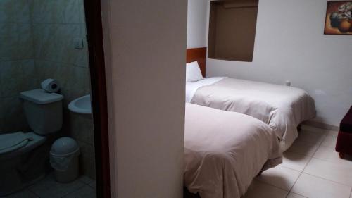 Inka's Rest Hostel客房内的一张或多张床位
