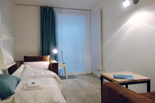 URBAN STAY Hamburg - Apartments Mitten im Herzen von Ottensen客房内的一张或多张床位